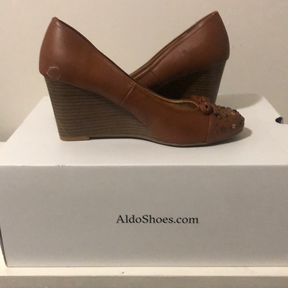 Brown wedge heels that are like new